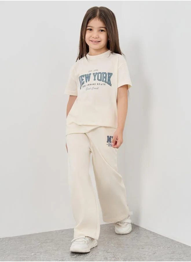 Styli Styli Slogan Print T-Shirt and Wide Leg Joggers Set