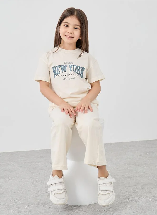 Styli Styli Slogan Print T-Shirt and Wide Leg Joggers Set