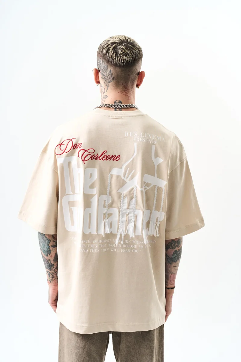ريسباير تي شيرت رجالي مقاس كبير (Oversize) بطبعة "Godfather"، بيج