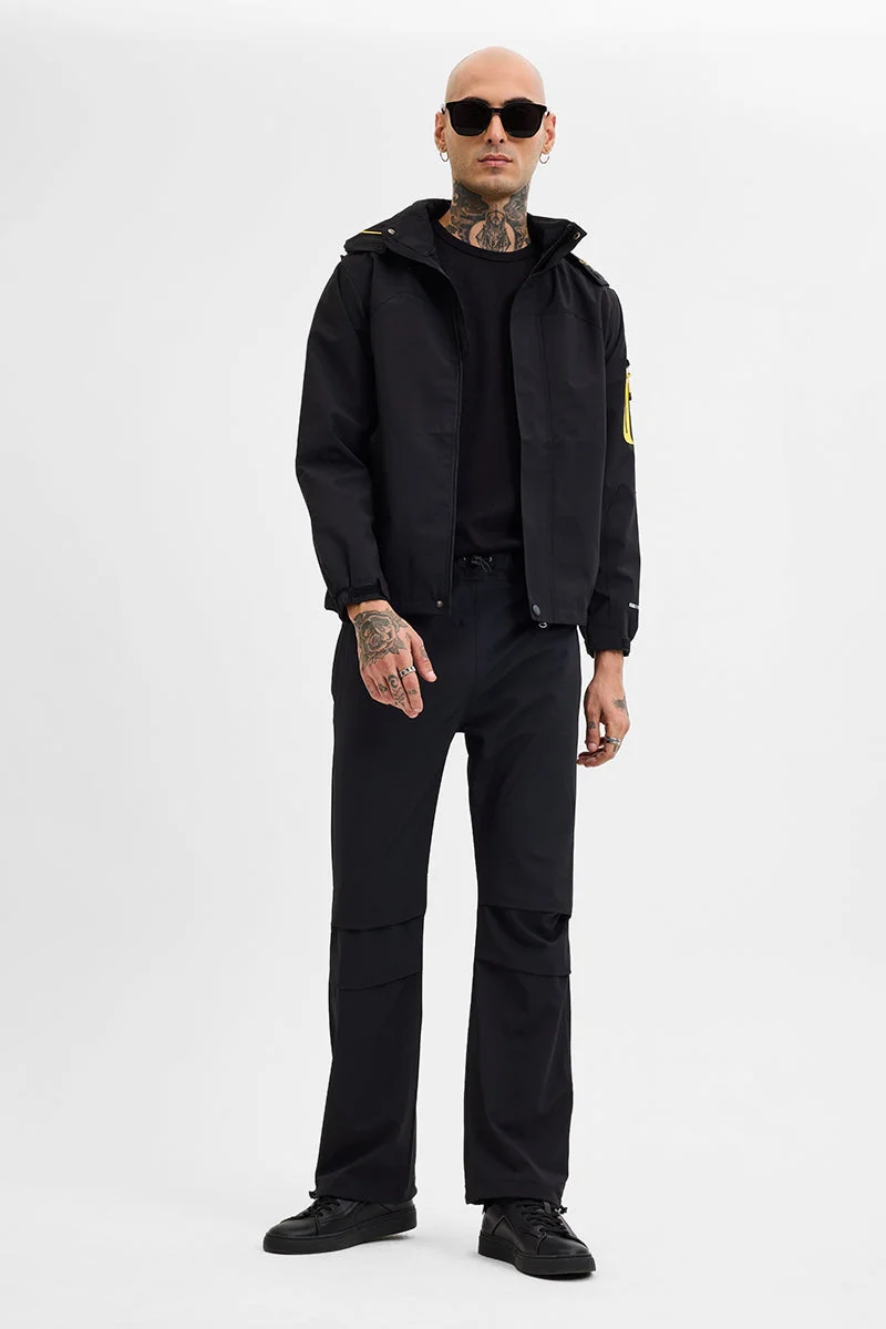 SNITCH بنطلون باراشوت أسود بقصة مريحة