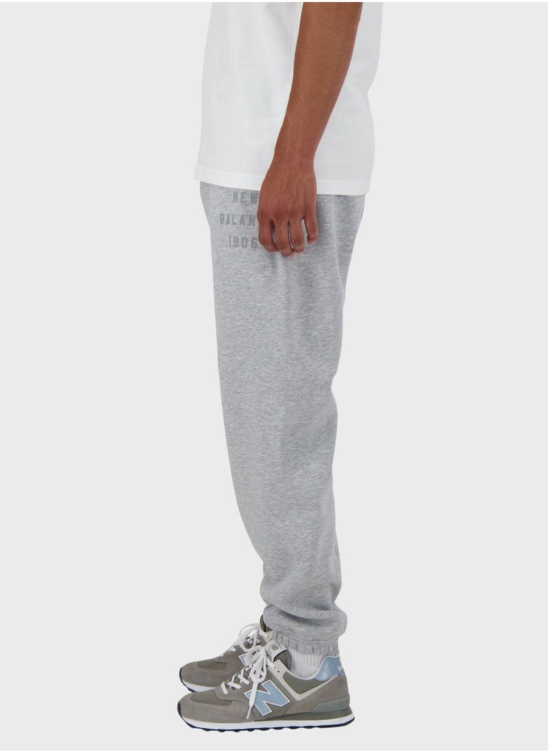 New Balance - Logo Fleece Graphic Sweatpants - Image 1
