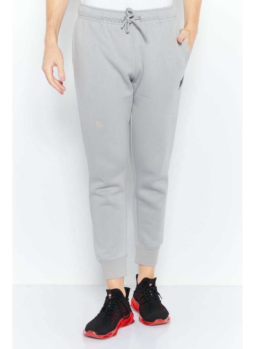 DKNY Sport Men Sportswear Fit Brand Logo Walking Jogger Pants, Light Grey  - Image 1