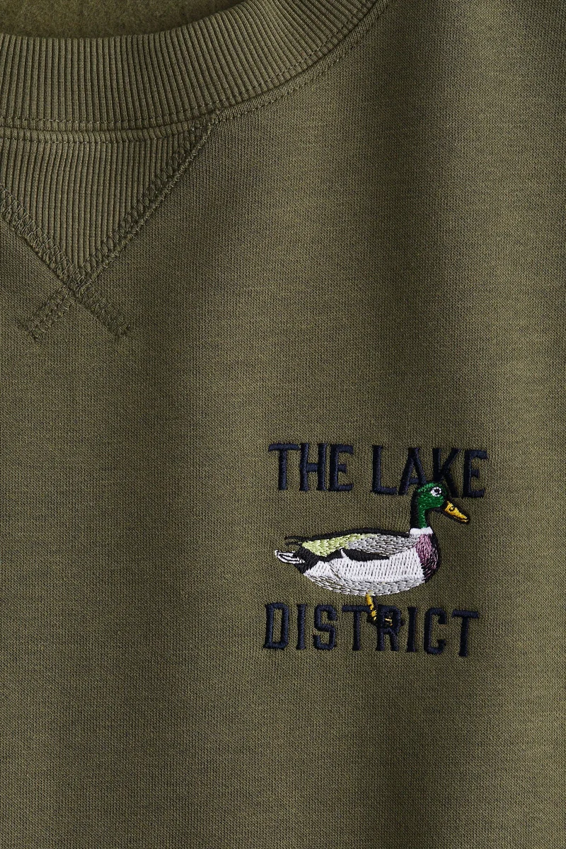 اتش اند ام سويت شيرت مزين بعبارة مطبوعة