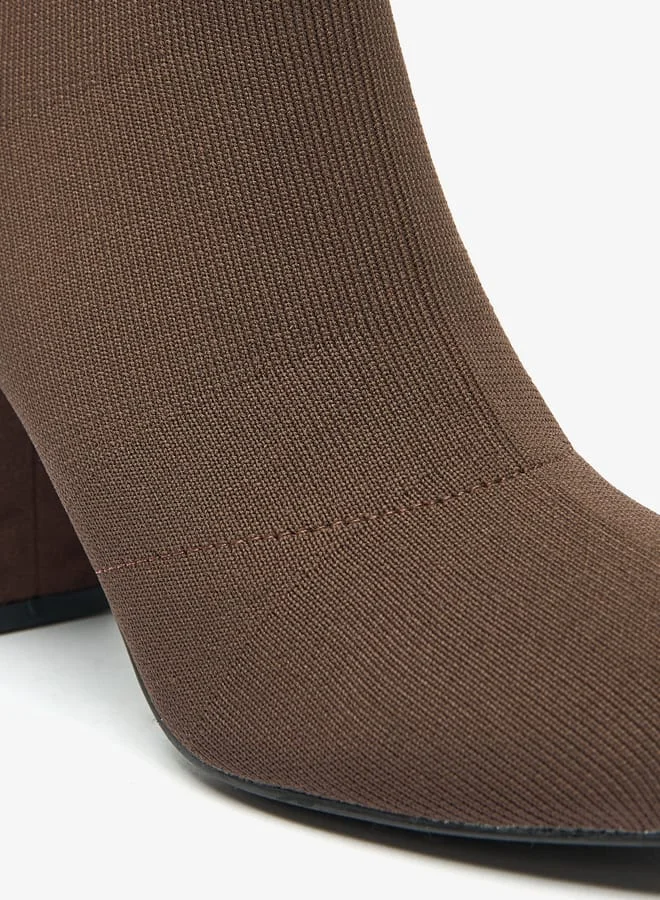 سيليست Womens Textured Ankle Boots with Block Heels and Slip-on Closure