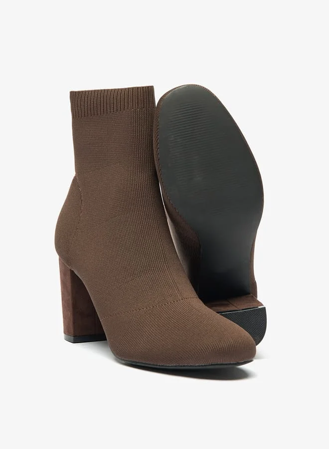 سيليست Womens Textured Ankle Boots with Block Heels and Slip-on Closure