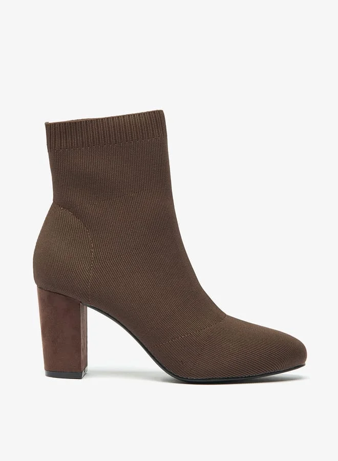 سيليست Womens Textured Ankle Boots with Block Heels and Slip-on Closure