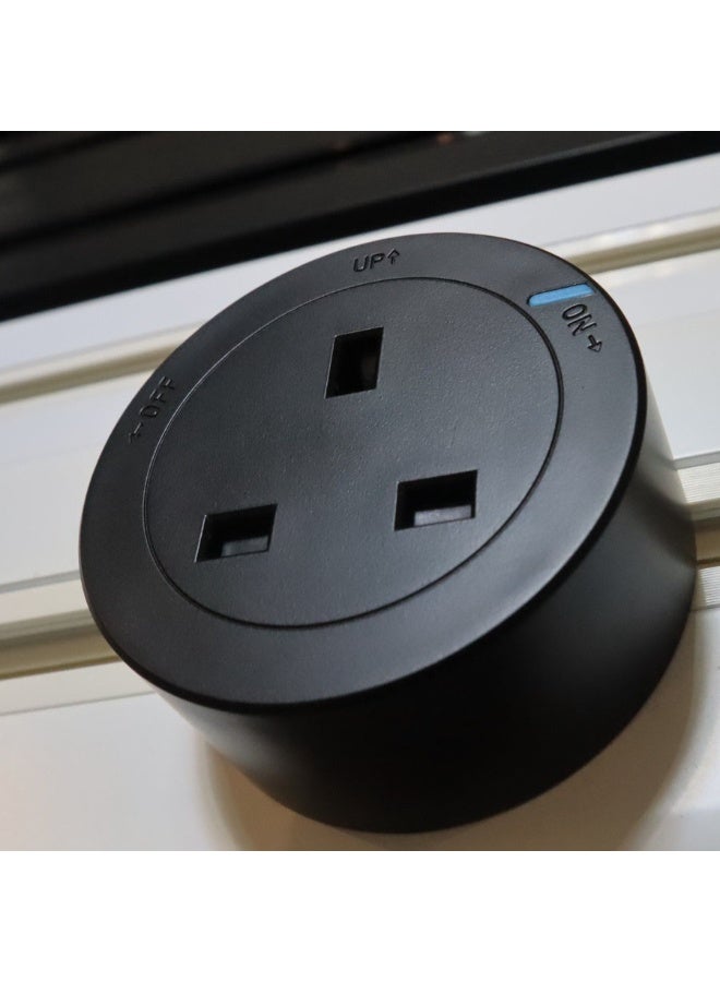 A movable electrical socket designed for use with a power track system. This type of socket is characterized by its flexibility. - Image 1
