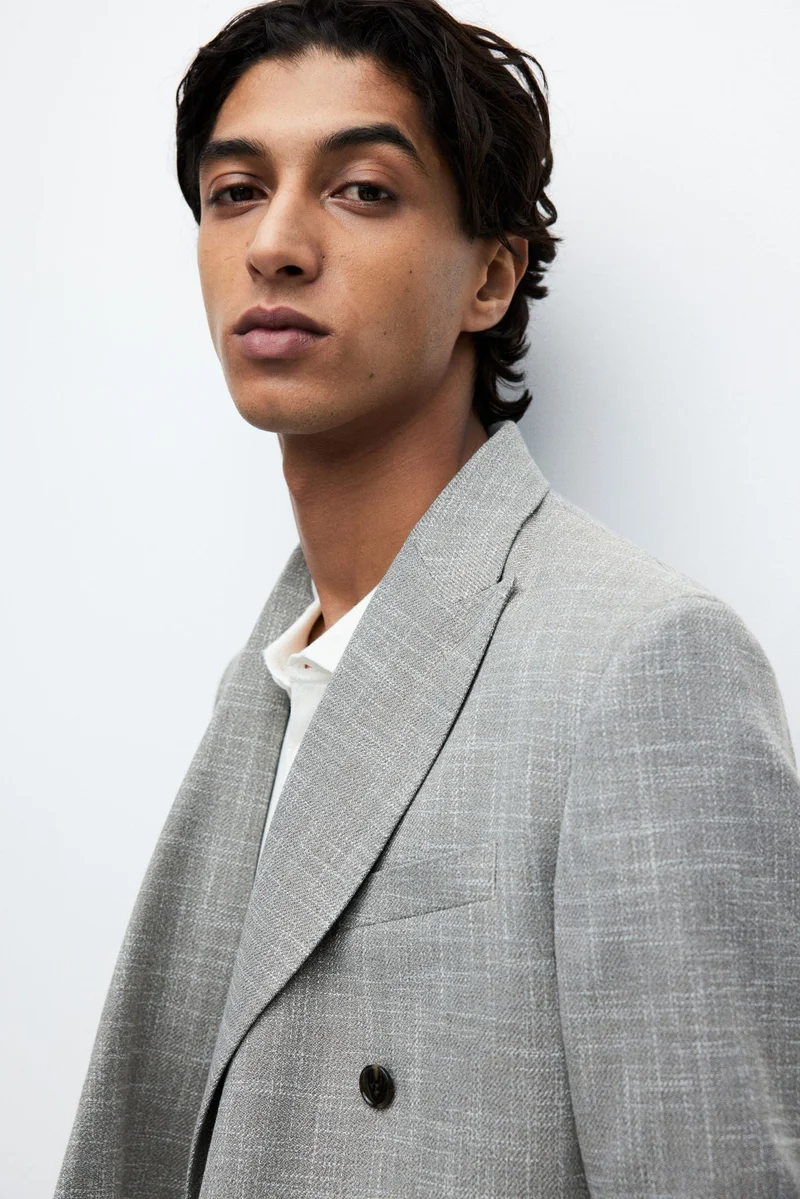 اتش اند ام جاكيت بأزرار مزدوجة وقصّة عادية