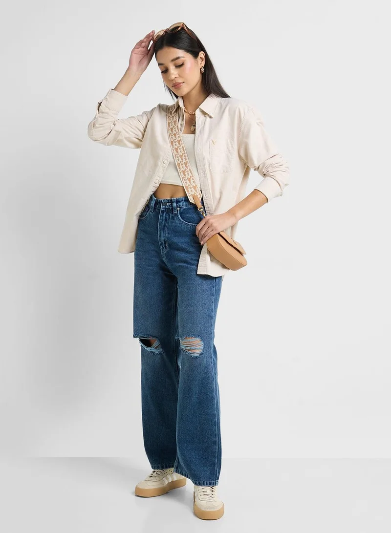 Ginger High Rise Distressed Wide Leg Jeans