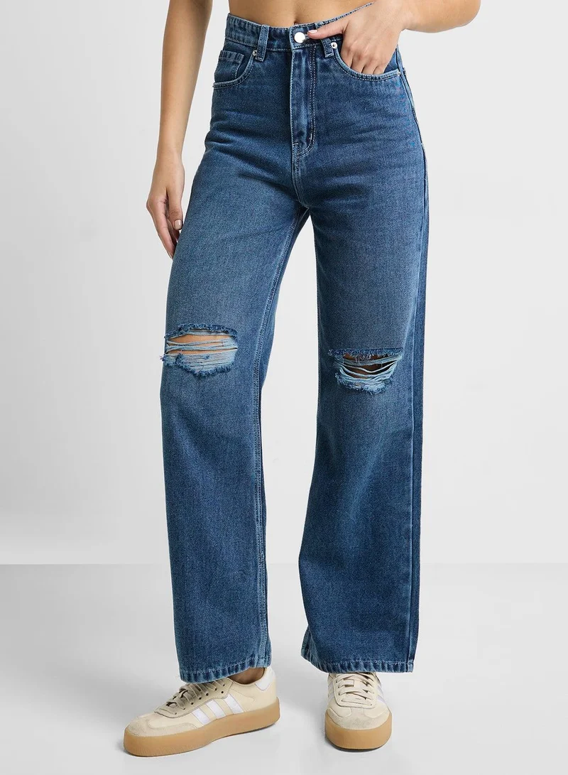 Ginger High Rise Distressed Wide Leg Jeans