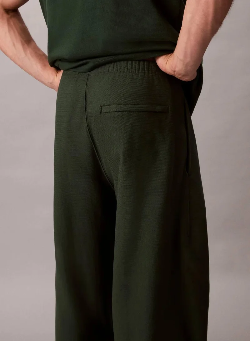 Calvin Klein Jeans Sycamore Cotton Terry Monogram Joggers for Men | Best Price UAE