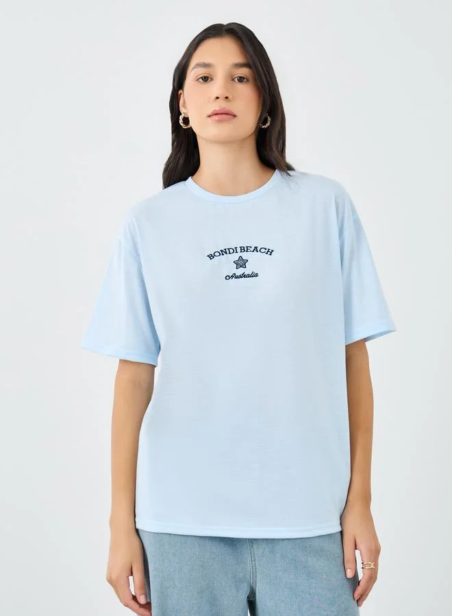 Styli Styli Women Light Blue Bondi Beach Embroidered Oversized T-Shirt