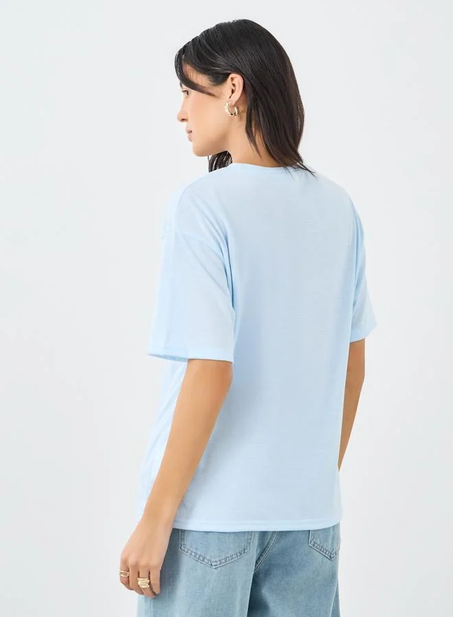 Styli Styli Women Light Blue Bondi Beach Embroidered Oversized T-Shirt