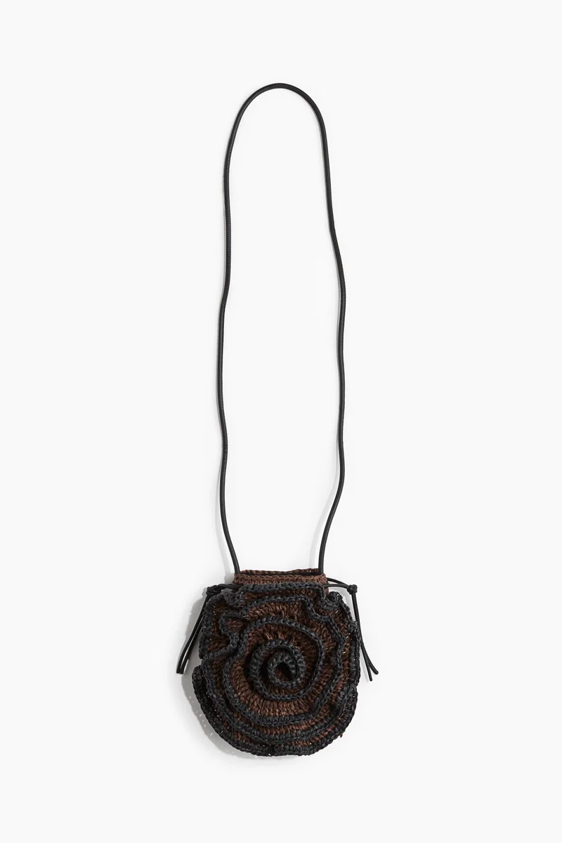 Appliquéd straw phone bag