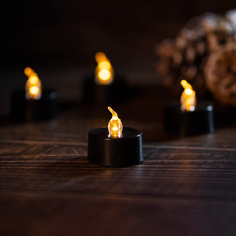 LANKER 24 Pack Black Tea Lights Candles, Flickering Warm Yellow Flameless LED Tealights, Long Lasting Battery Operated Fake Candles, Decoration for Wedding, Halloween and Christmas - Image 2