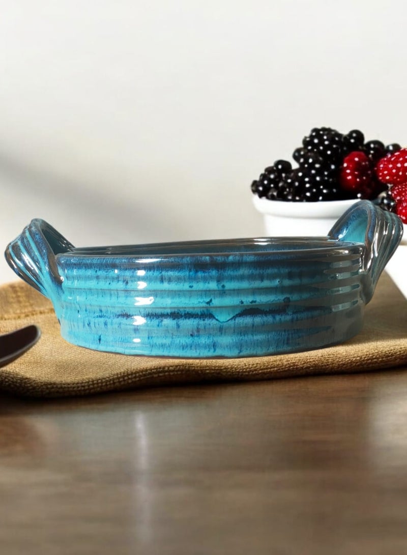 A casserole with a handle made of pottery and porcelain that can withstand direct and indirect heat, flame or in the oven. - Image 2