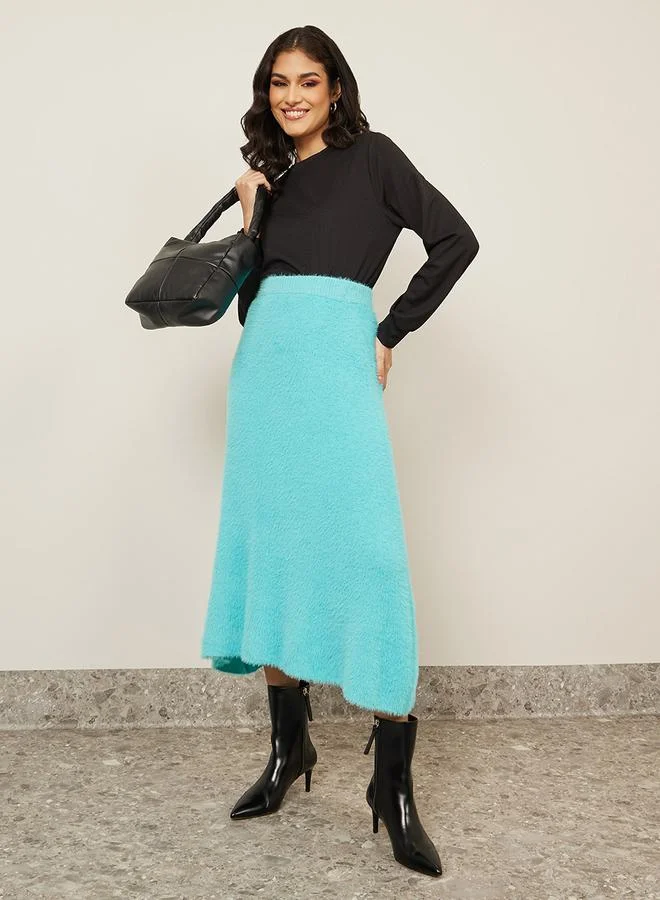Styli Flat Knit Asymmetric Hem Midi Skirt