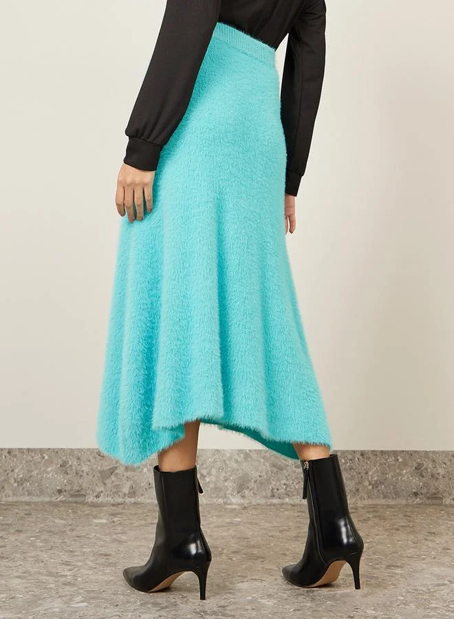 Styli Flat Knit Asymmetric Hem Midi Skirt