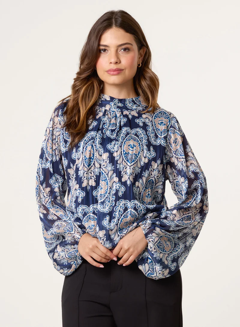 بلو فانيلا High Neck Bubble Hem Printed Blouse