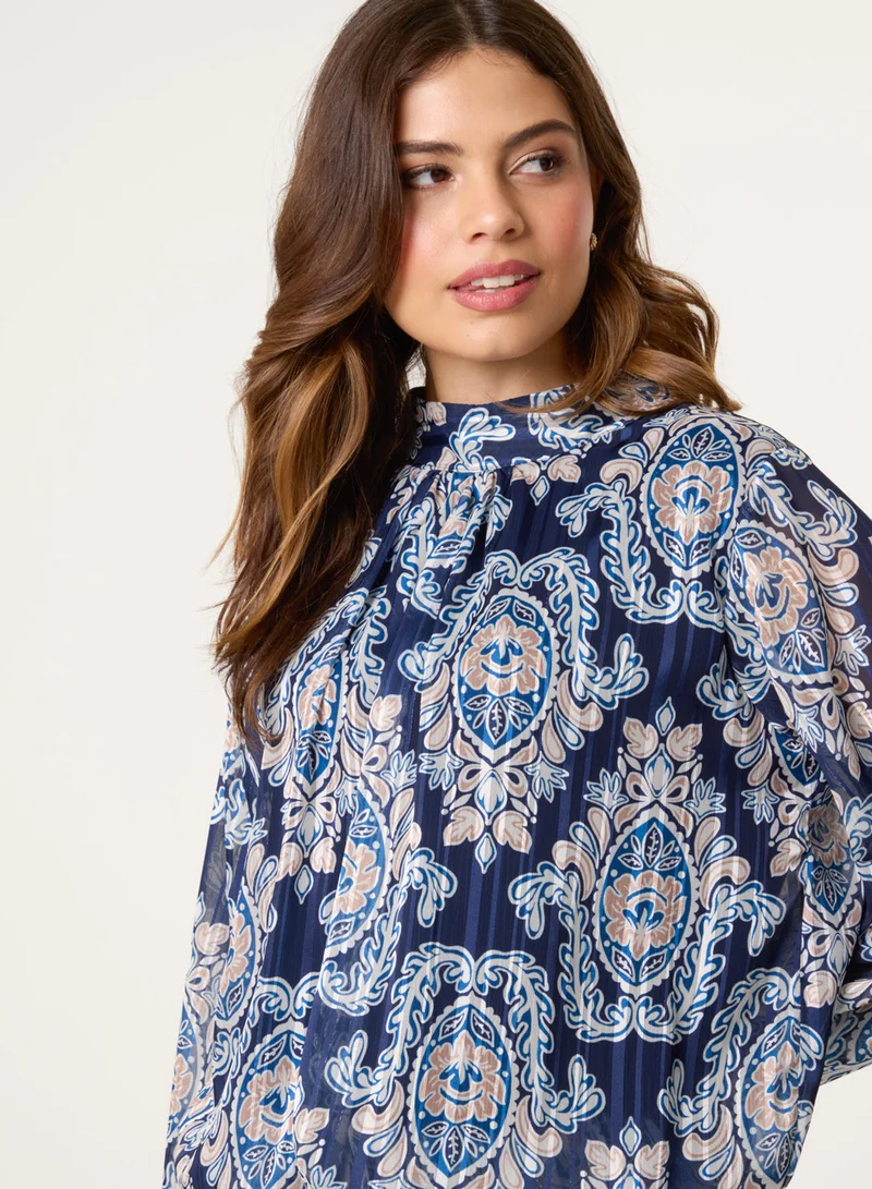 بلو فانيلا High Neck Bubble Hem Printed Blouse