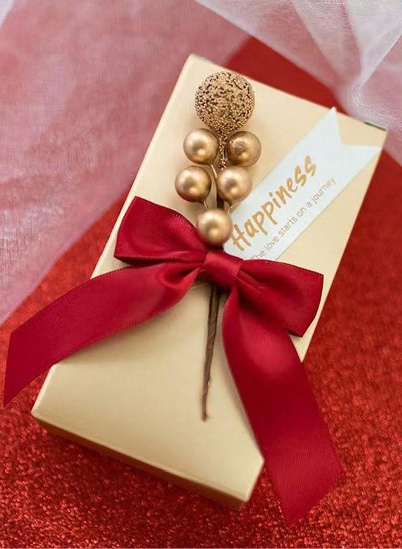 توزيعات العيد علبة توزيعات العيد باللون الذهبي مزينه بفيونكه حمراء لتقديم هدايا الاكسسوارات  و جميع انواع الهدايا مناسبه للعيد و لحفلات التخرج والخطوبه والاعراس - Image 1