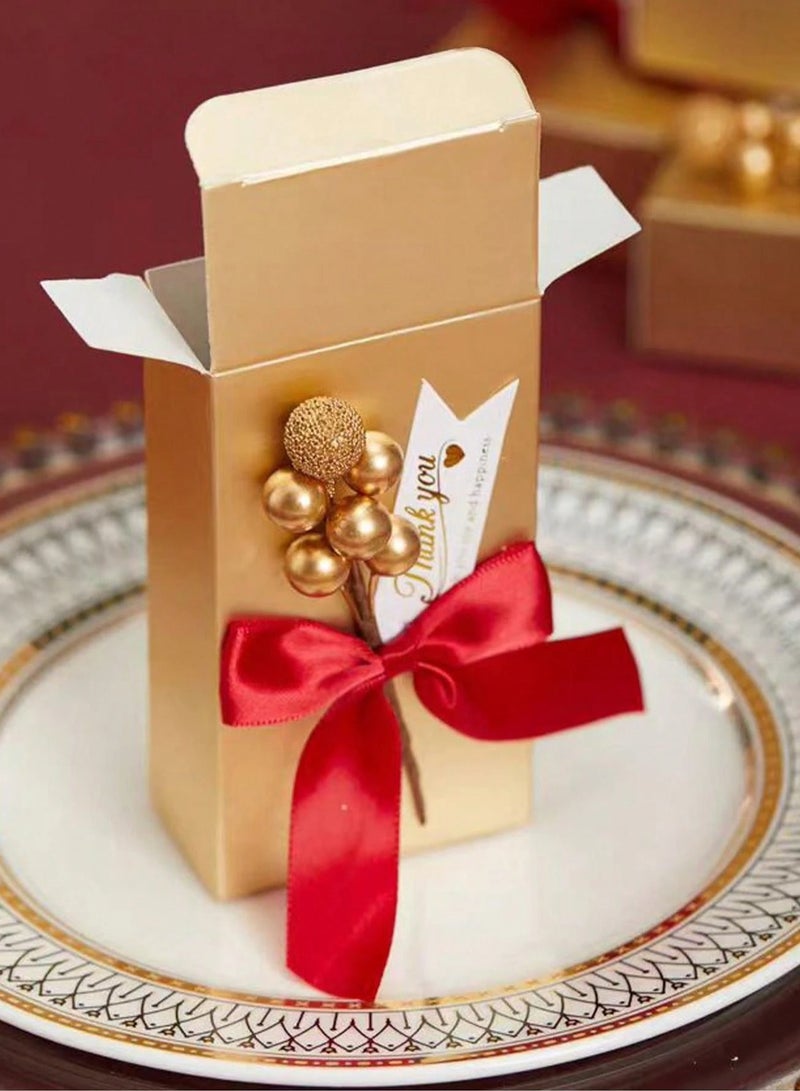 توزيعات العيد علبة توزيعات العيد باللون الذهبي مزينه بفيونكه حمراء لتقديم هدايا الاكسسوارات  و جميع انواع الهدايا مناسبه للعيد و لحفلات التخرج والخطوبه والاعراس - Image 2