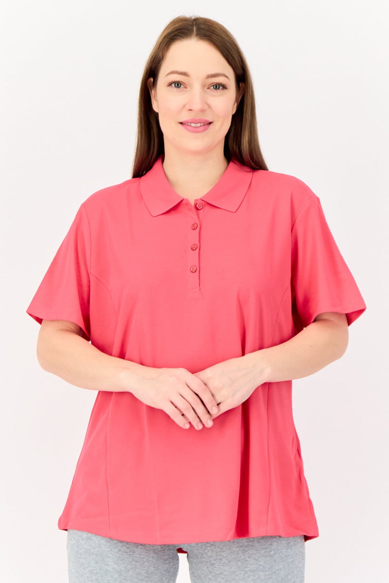 Greg Norman Women Sportswear Fit Solid Short Sleeve Training Polo Shirt, Fuchsia  - Image 1