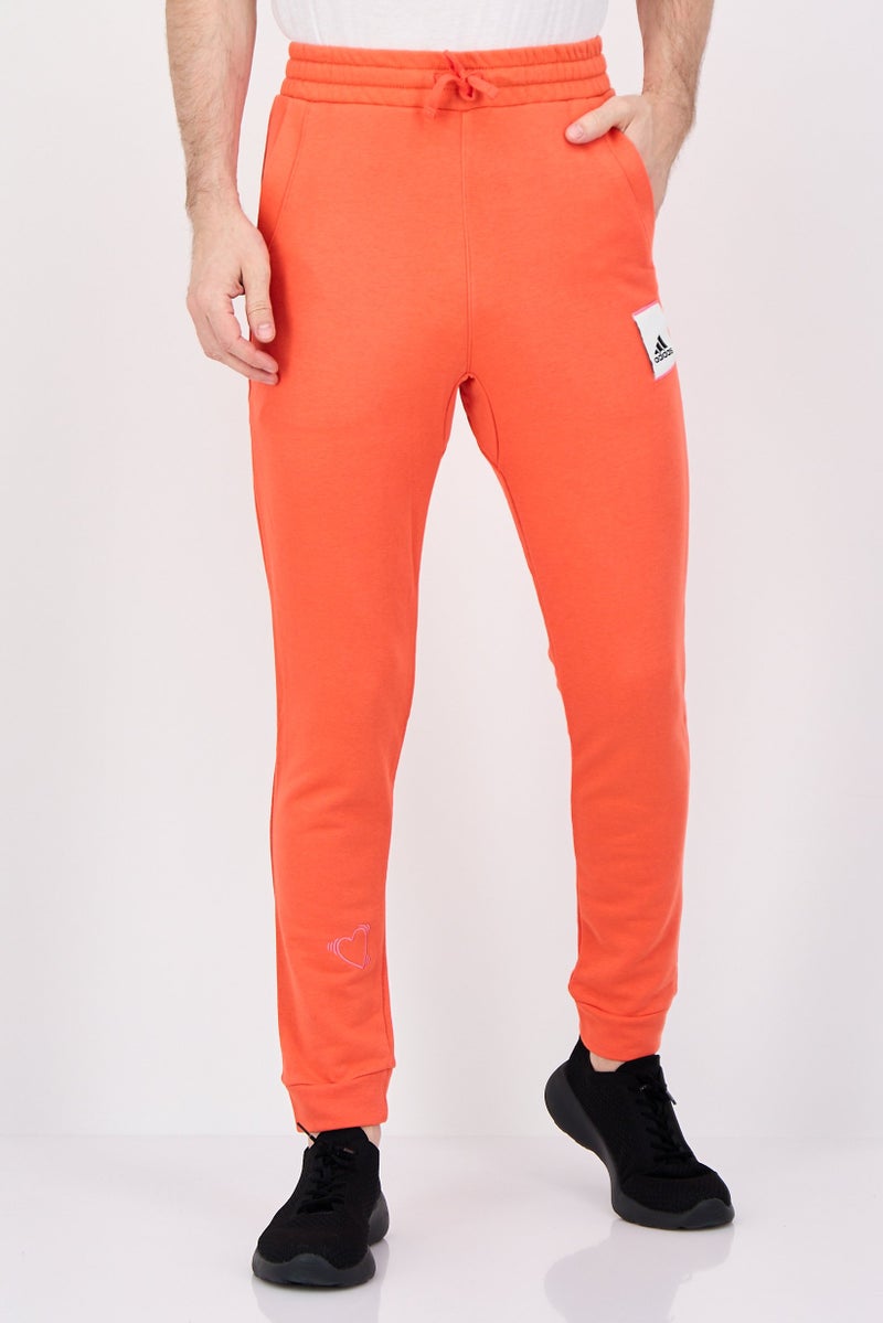 Adidas Men Sportswear Fit Outdoor Sweatpants, Orange - Image 1