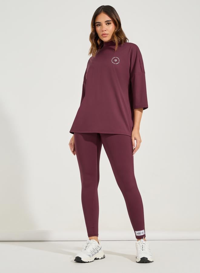 ستايلي اكتيف ليقنز مطبع بكتابة جانبية مع تفاصيل درزات - Image 1