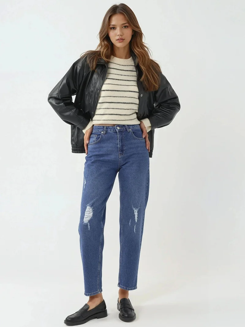 زوبعة جينز ضيق مفصل بتصميم ممزق