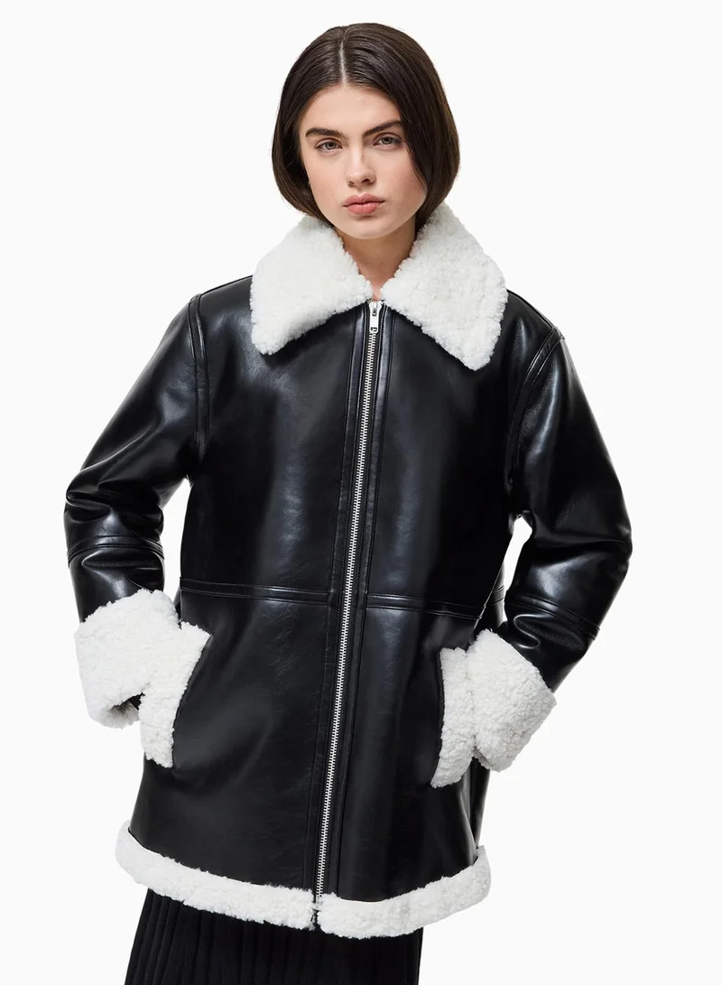 French Connection Black Cream Ajani Faux Fur Coat for Women | Best Price UAE