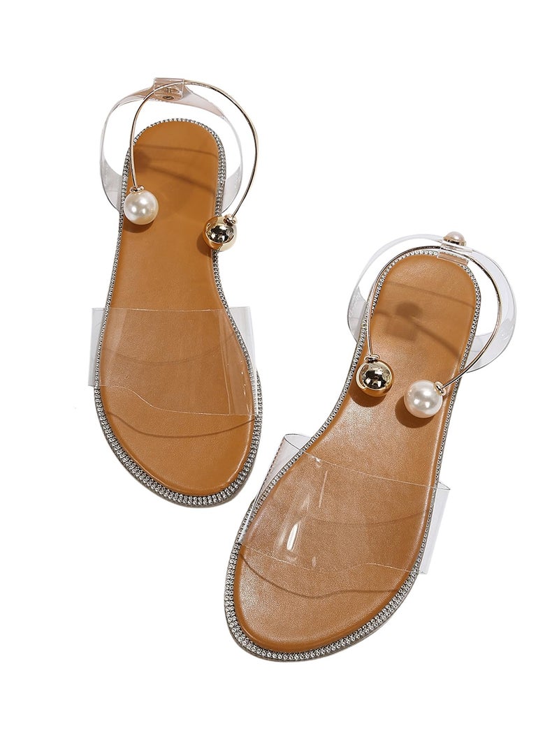 OYOANGLE Women's Pearl Decor Clear Straps Open Toe Flat Sandals Leather Outdoor Beach Sandals Apricot 8.5 - Image 1
