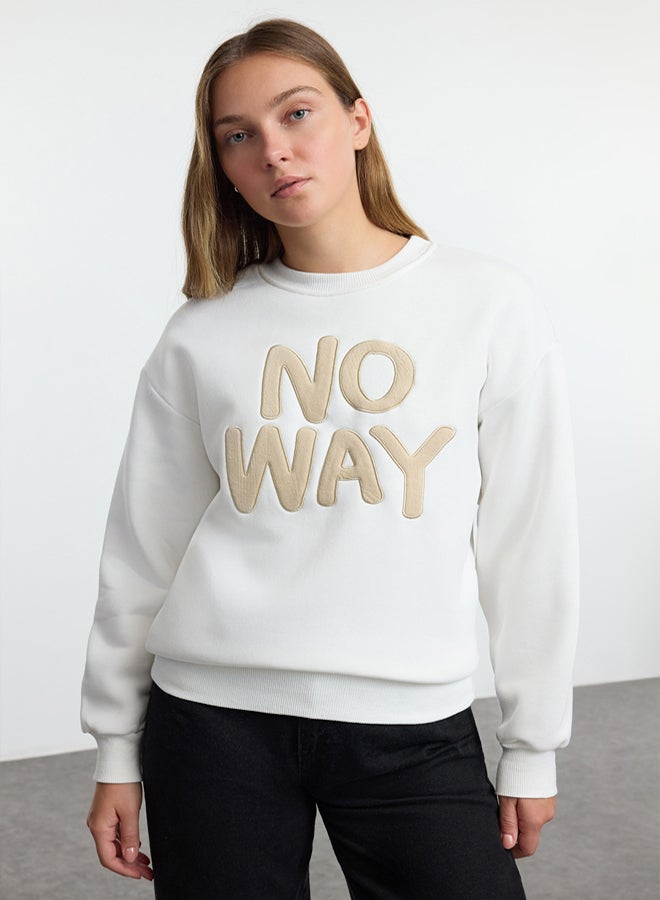 trendyol Ecru Slogan Embroidered Regular/Normal Fit Crew Neck Thick Knitted Sweatshirt TWOAW25SW00040 - Image 1