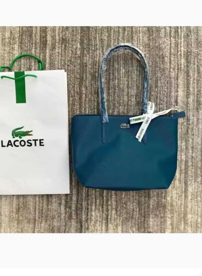 LACOSTE حقيبة يد صغيرة بسحاب متعددة الاستخدامات للنساء من لاكوست باللون الأزرق الببغائي - Image 1