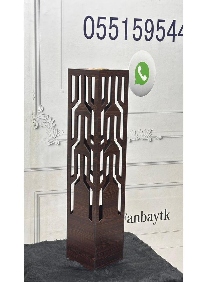 fan baytk A brown wooden incense burner with a luxurious heritage design, measuring 17 x 17 x 80 cm, for halls, sitting rooms, and special occasions. This incense burner offers multiple uses. It's more than just a space fragrance tool; it's a decorative piece that exudes elegance, blending in with both formal and intimate settings. It's suitable for everyday use or as a sophisticated gift that expresses refined taste and artistic flair. - Image 2
