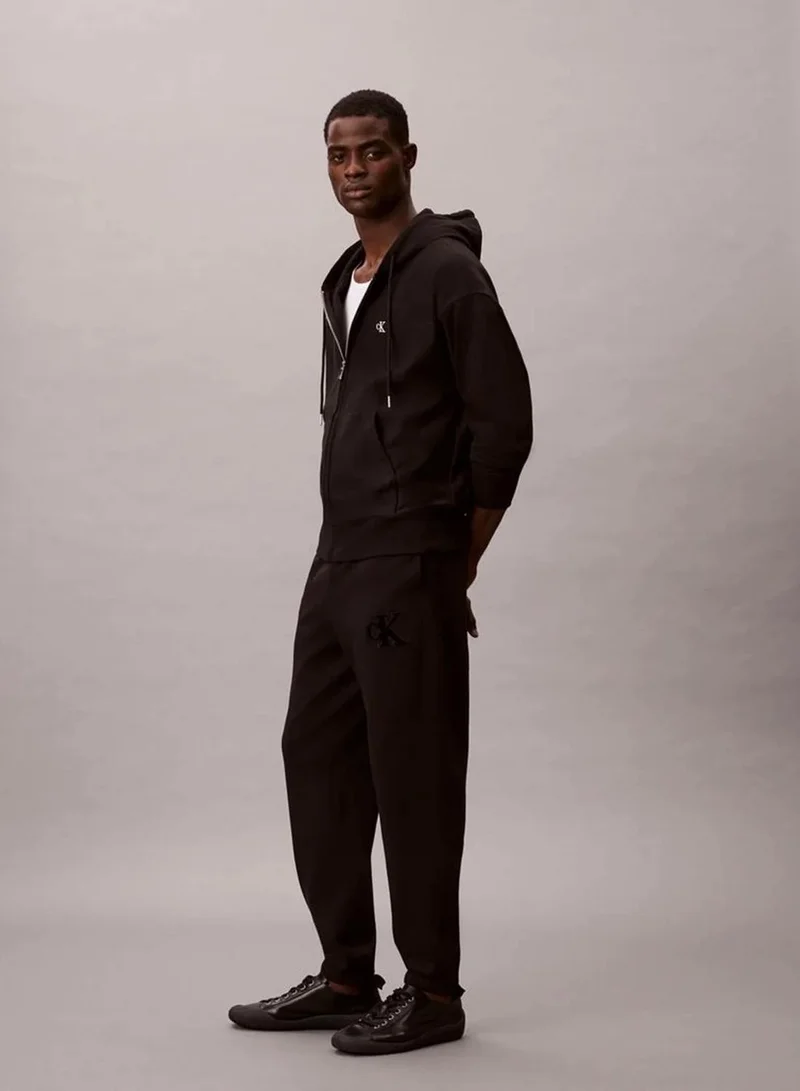 Calvin Klein Jeans  Fleece Monogram Logo Patch Joggers  | Best Price UAE