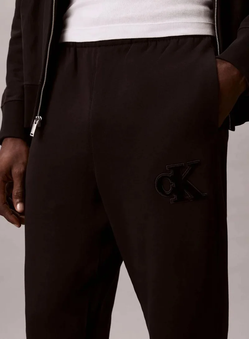 Calvin Klein Jeans  Fleece Monogram Logo Patch Joggers  | Best Price UAE