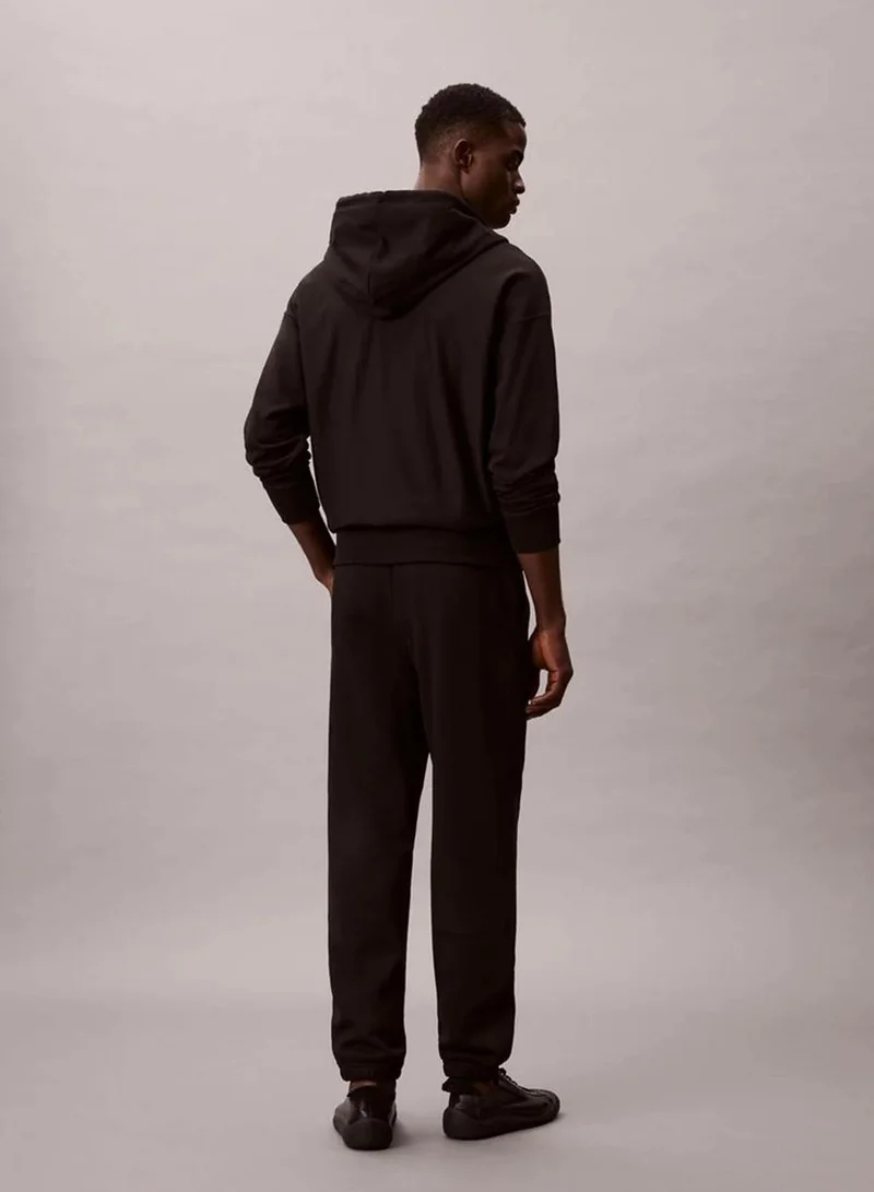 Calvin Klein Jeans  Fleece Monogram Logo Patch Joggers  | Best Price UAE
