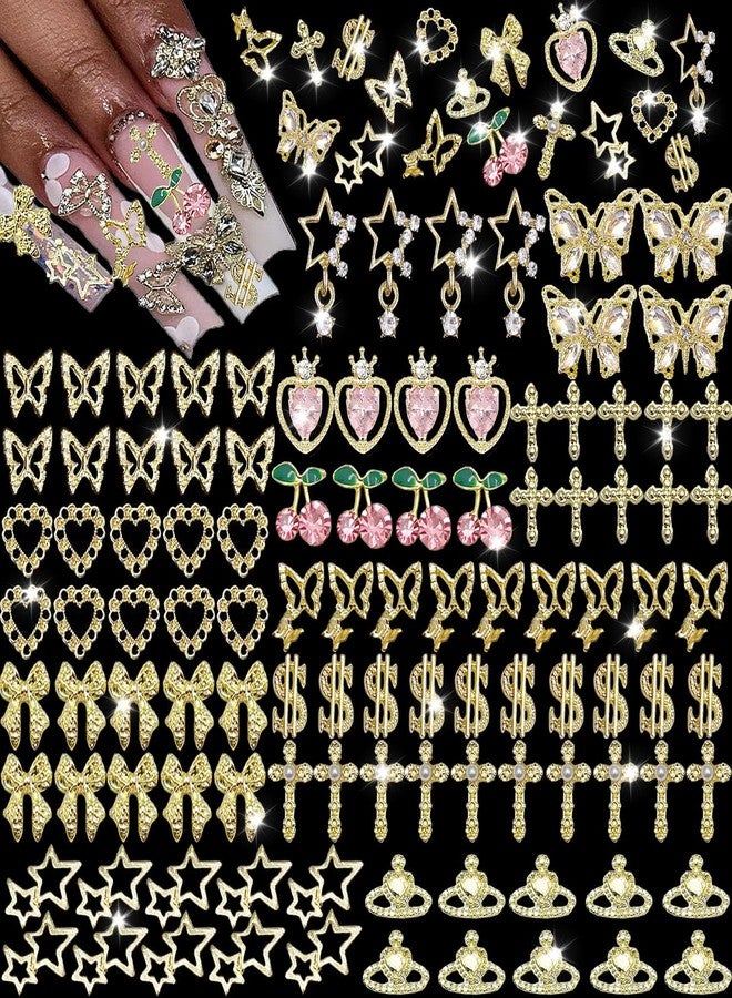 KACHIMOO 106 PCS Gold Nail Charms 3D Nail Art Charms Cherry Butterfly Cross Bow Star Heart Dollar 3D Nail Gems for Women Nail Art DIY Design - Image 1