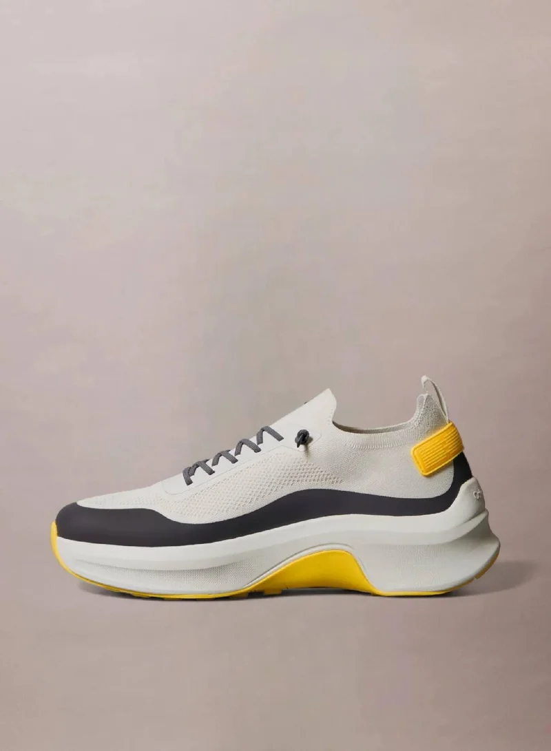 Calvin Klein Jeans Vaporous White/Coal/Buttercup Chunky Runner Sock Knit Trainers for Men | Best Price UAE