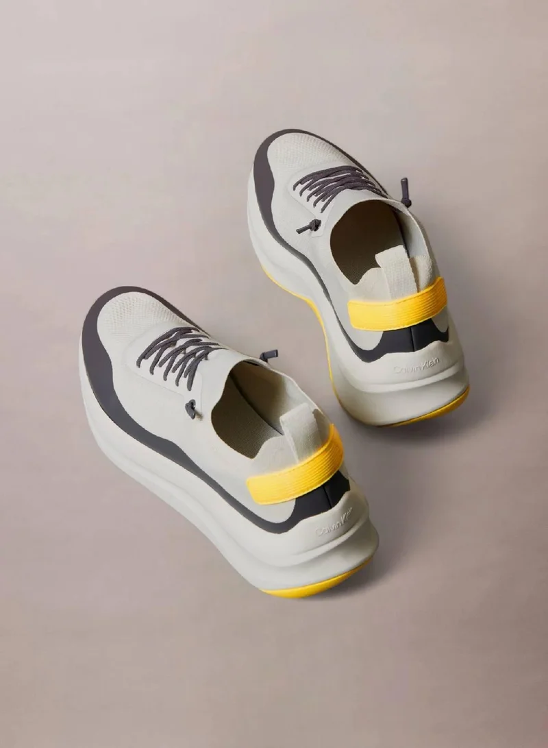 Calvin Klein Jeans Vaporous White/Coal/Buttercup Chunky Runner Sock Knit Trainers for Men | Best Price UAE
