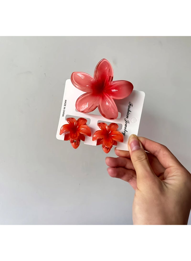 Hawaiian Flower Hair Clip Set – 3 Pieces (1 Large & 2 Small) Acrylic Design with Soft Red Touch - Image 2