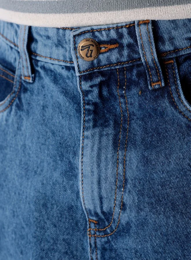 شركة المرآب الهندية Men Loose Tapered Solid Mid-Rise Jeans