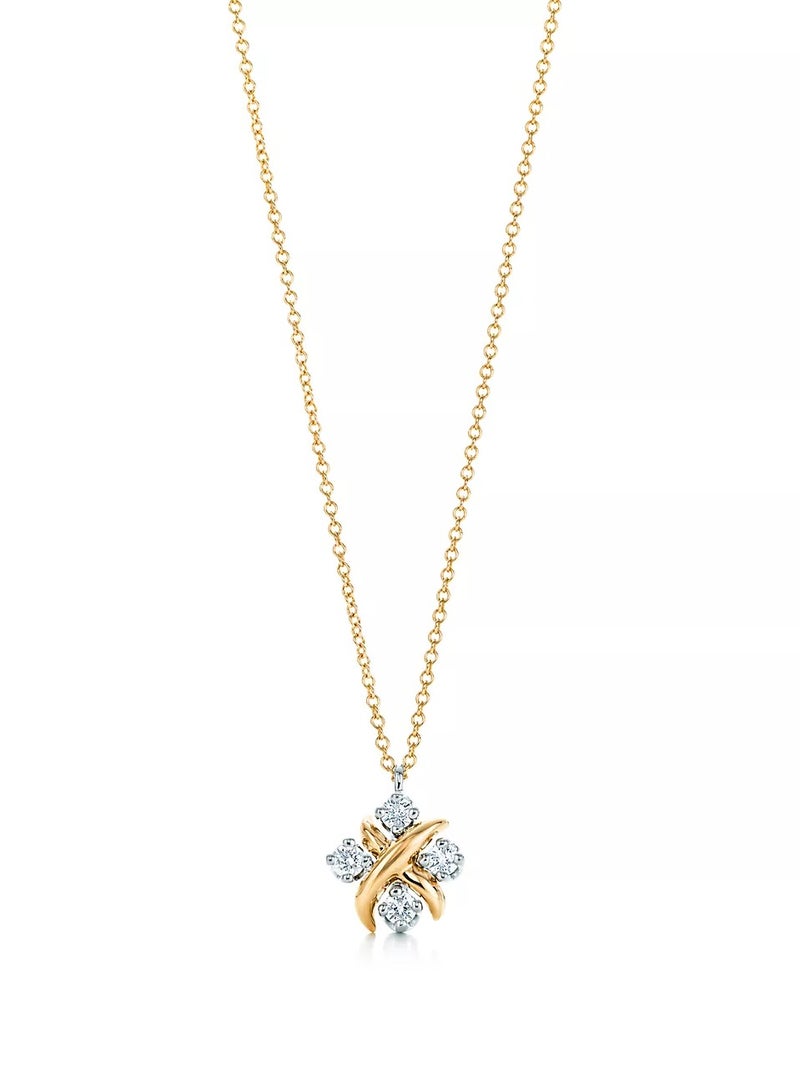 Tiffany & Co. Jean Schlumberger by Tiffany Lynn pendant in 18k gold with diamonds in platinum.  - Image 1