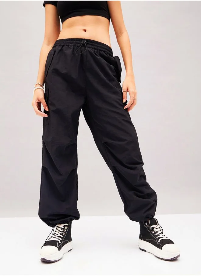 SASSAFRAS Solid Cargo Parachute Pants by Styli