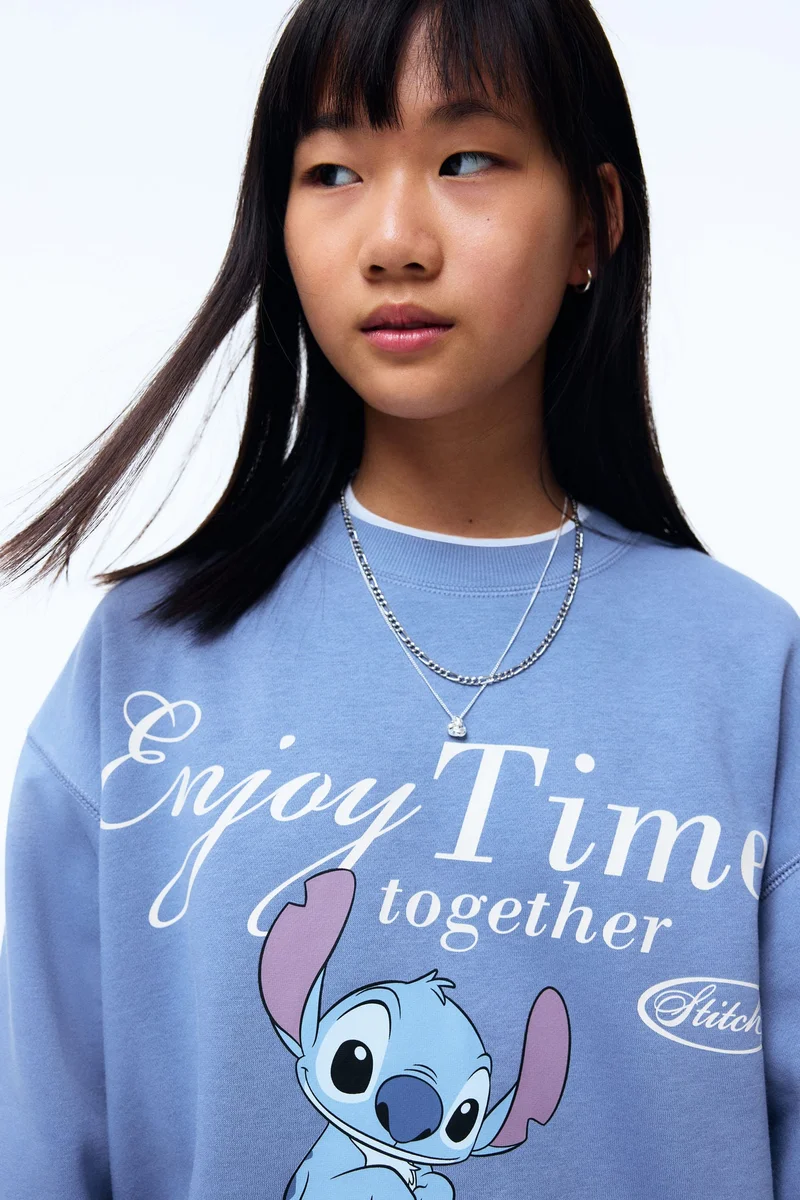 اتش اند ام سويت-شيرت فضفاض بطبعة مميزة