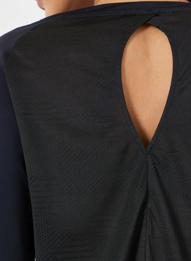Styli Active  Back Texture Peep Detail Long Sleeve Top for Women | Best Price UAE