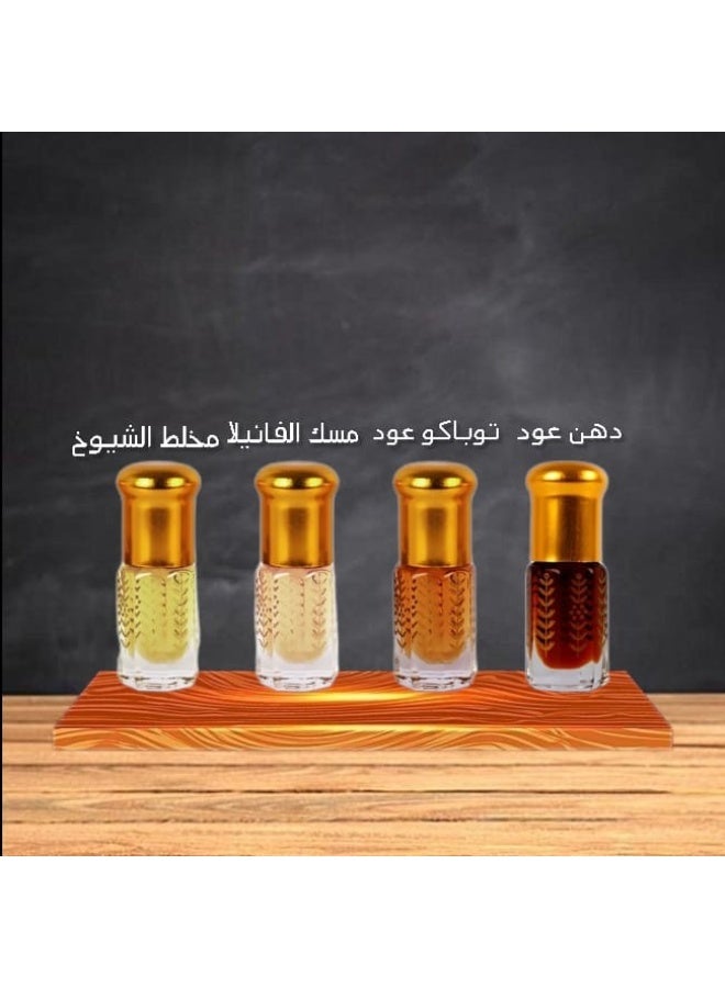 A collection of scented blends—Dehn Al Oudh, Tobacco Oudh, Vanilla Musk, and Mukhallat Al-Shuyoukh—comprising four 6ml bottles.