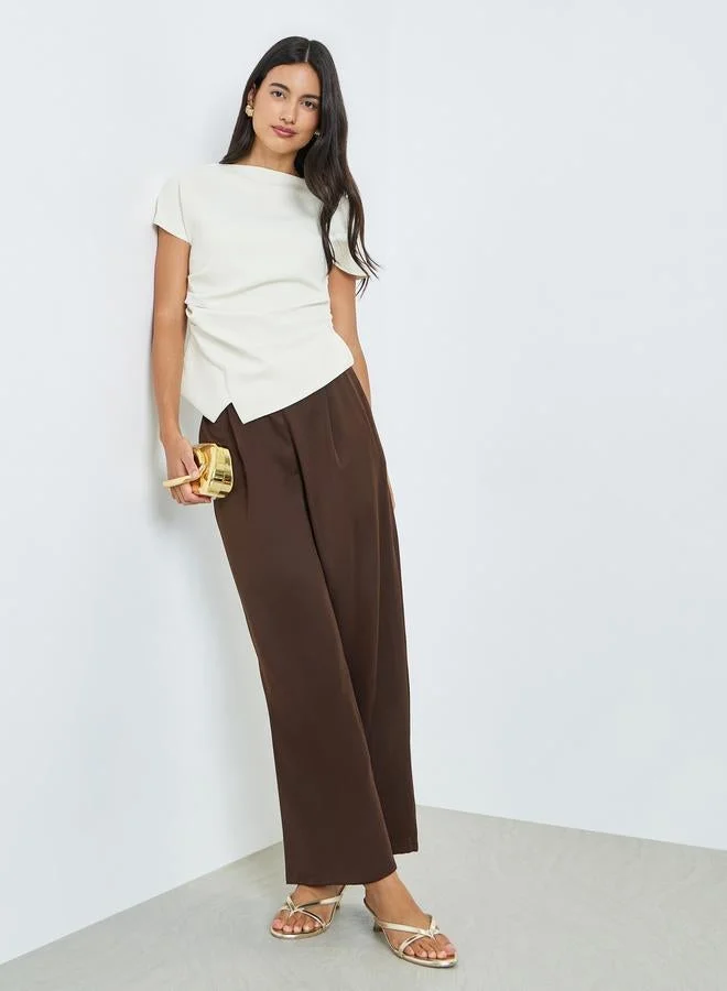 ستايلي بلوزة سادة بحافة غير متماثلة الطول