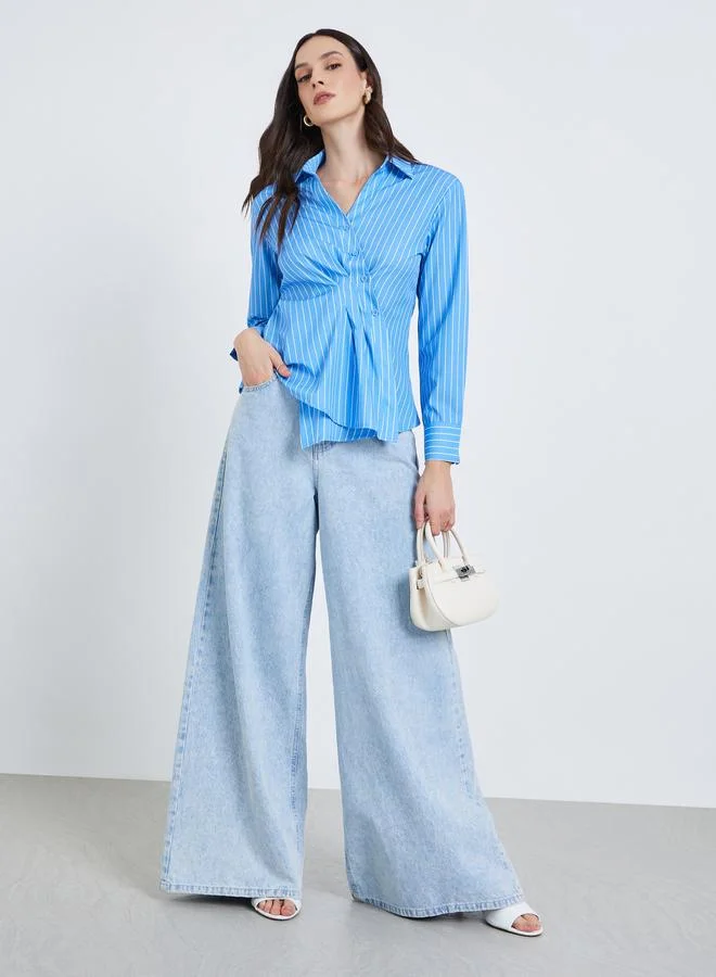 ستايلي بلوزة مخططة بنمط لف